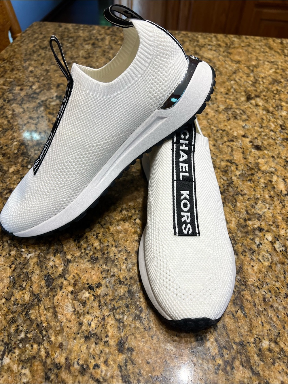 Michael Kors White Slip-On Knit Sneakers with Black Branding - Picture 2 of 9